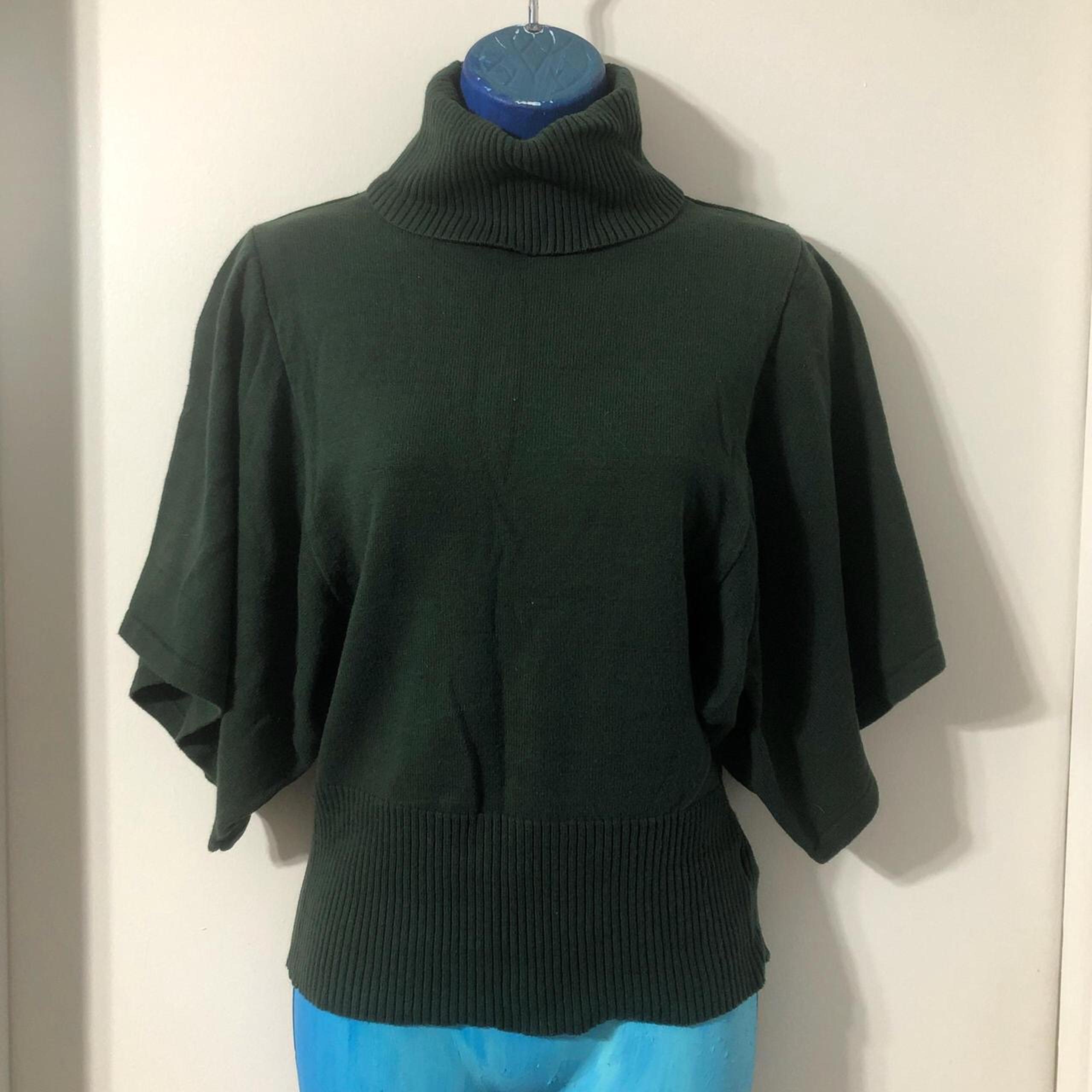 Forest green turtleneck sweater with a high neck