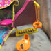 Lot of Polly Pocket Furniture and Pool and Slide and Tables