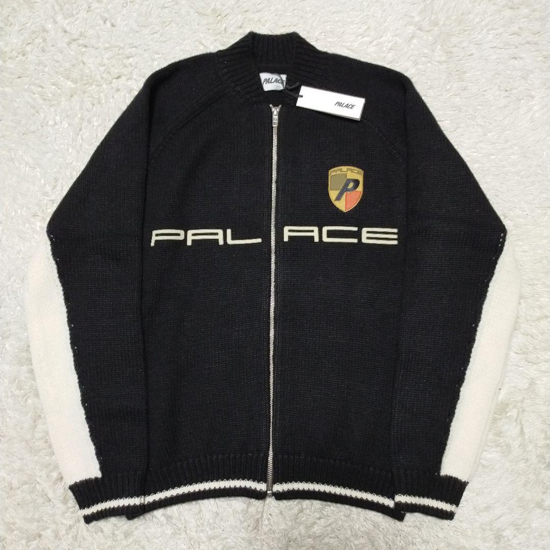 Tag attached, unused PALACE wool posh knit in navy with Porsche logo.