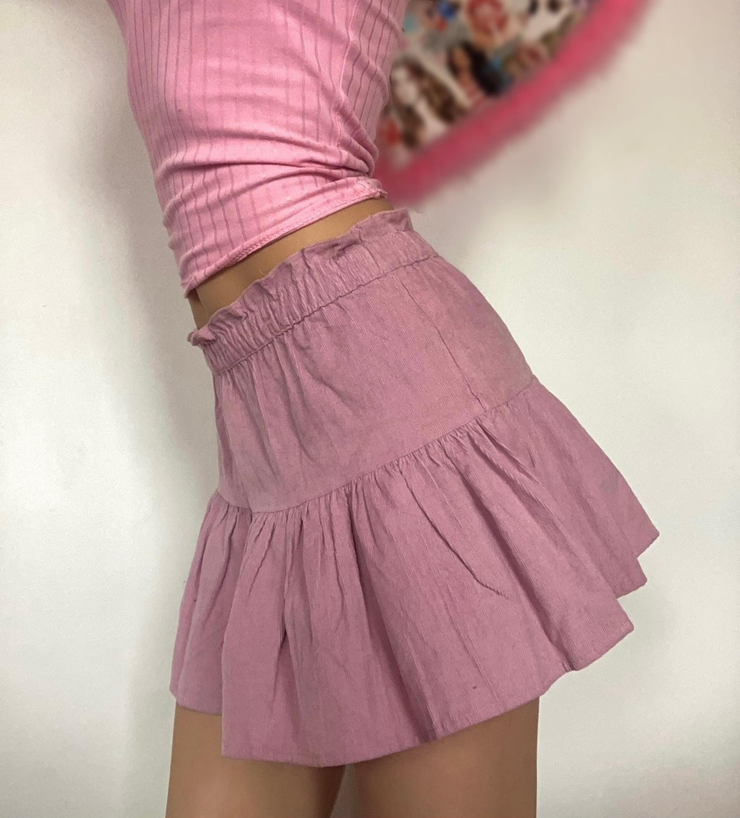 Light purple pleated mini skirt