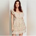 LOVE THE LABEL Ines Floral V-neck Tiered Ruffle Flutter Mini Dress Large