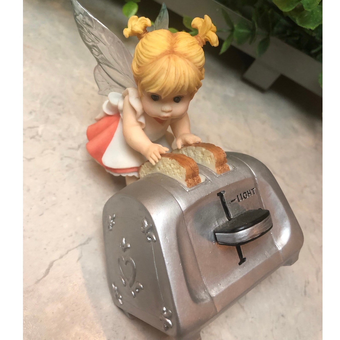 Vintage 2007 Enesco Little kitchen toaster fairy, sitting toast