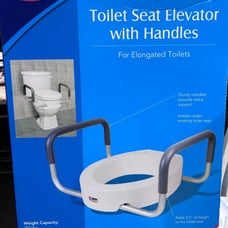 Toilet seat elevator with handles