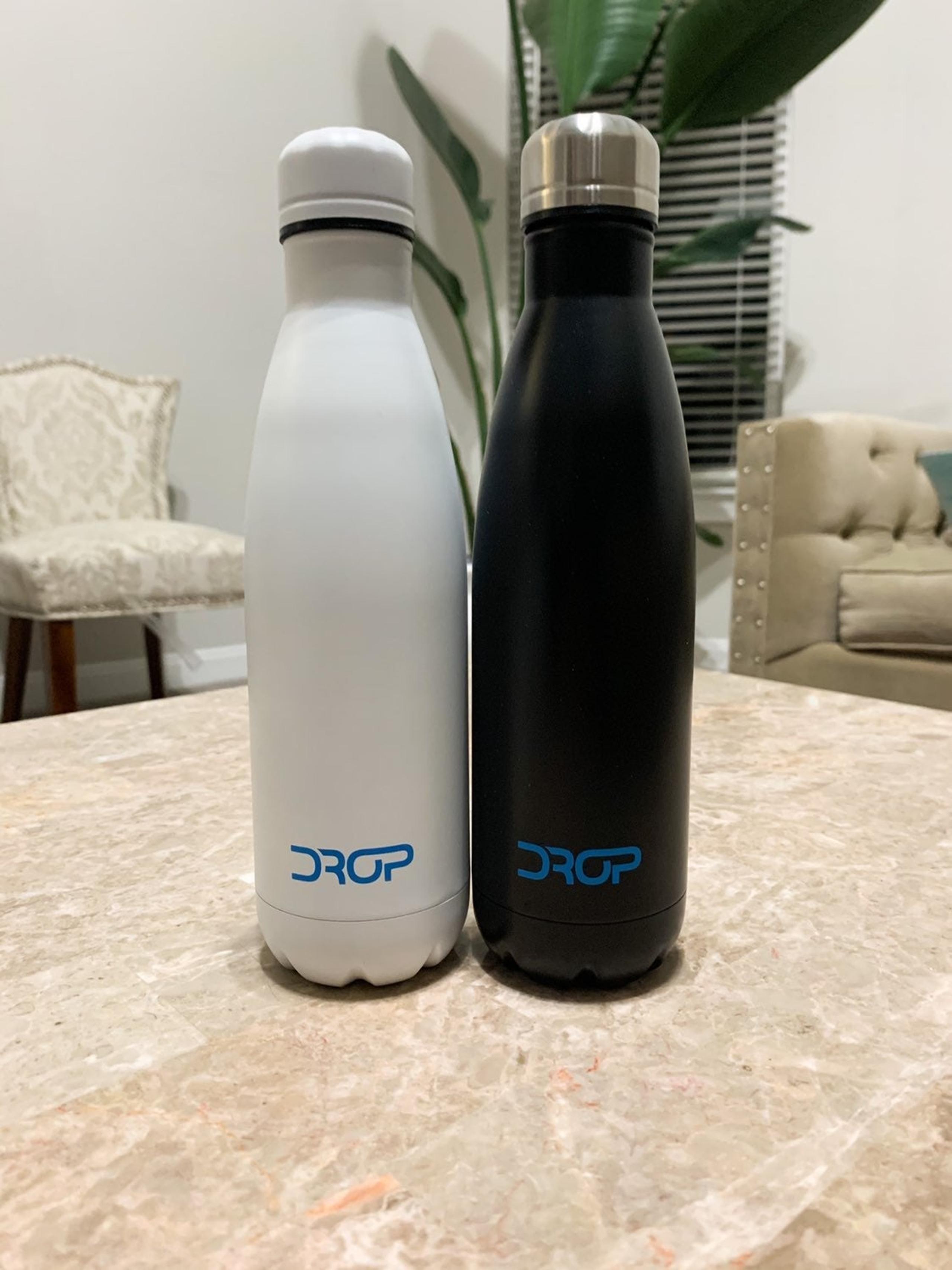 Two insulated white & black water bottle
