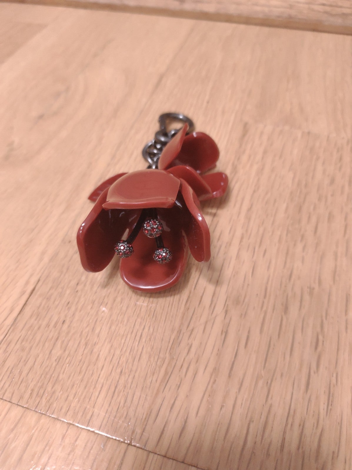 EUC Coach Red Flower Charm with red crystals