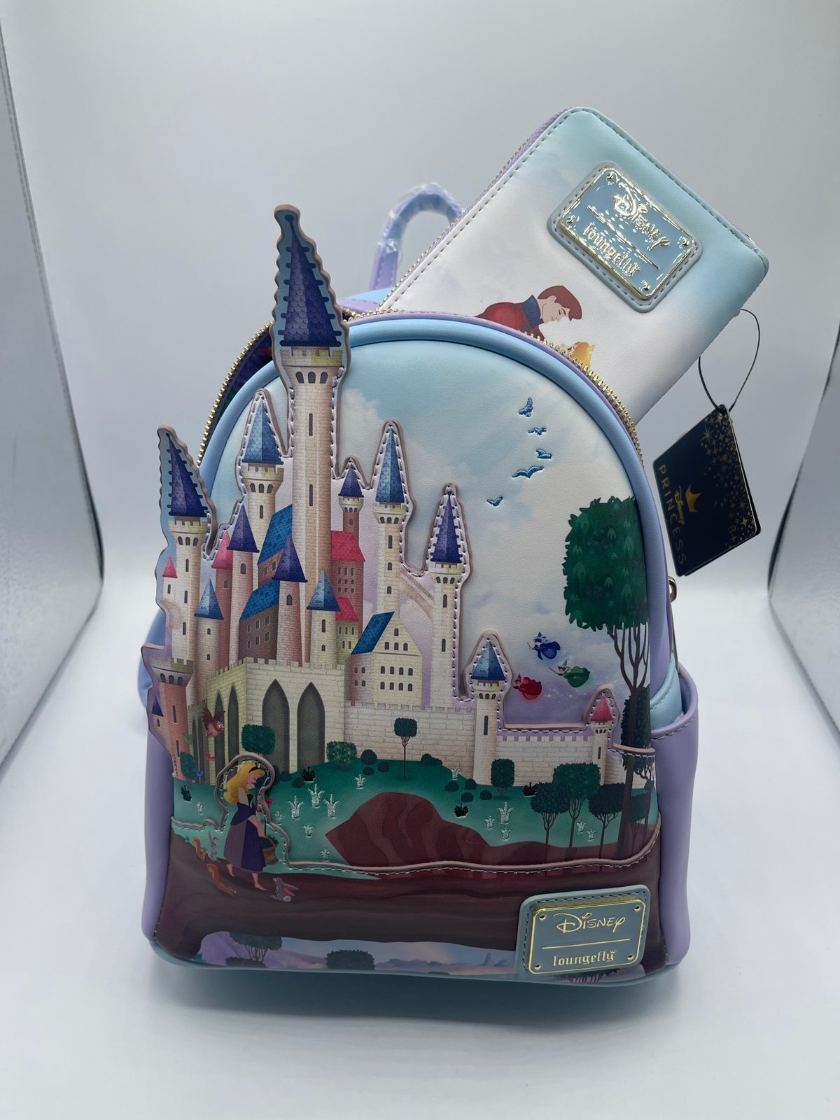 Loungefly, sleeping beauty bag, and zip up purse
