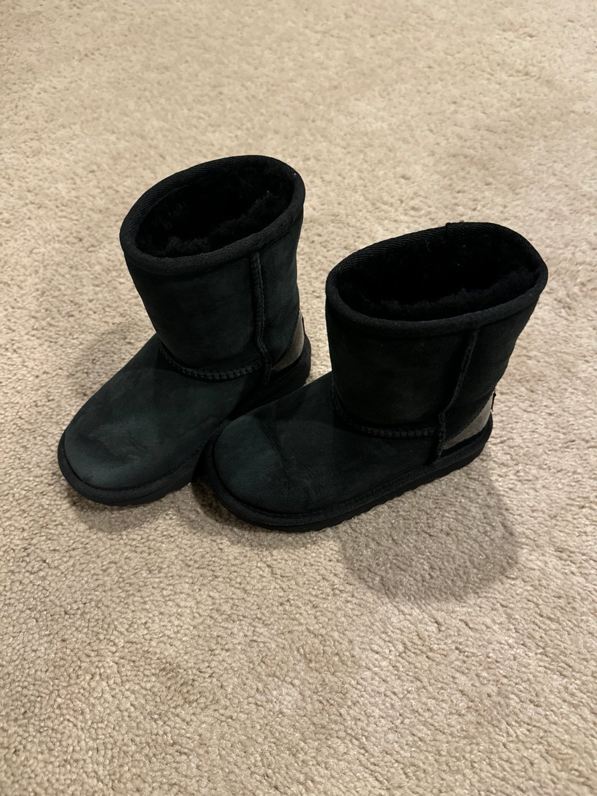 Kids black UGGs
