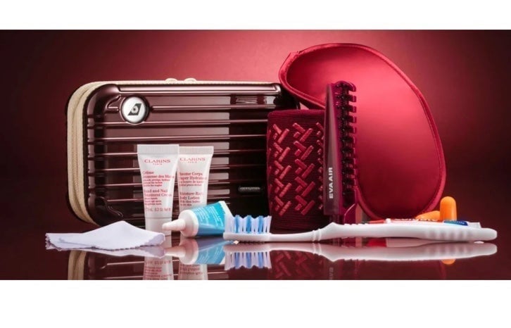 red rimowa travel beauty kit