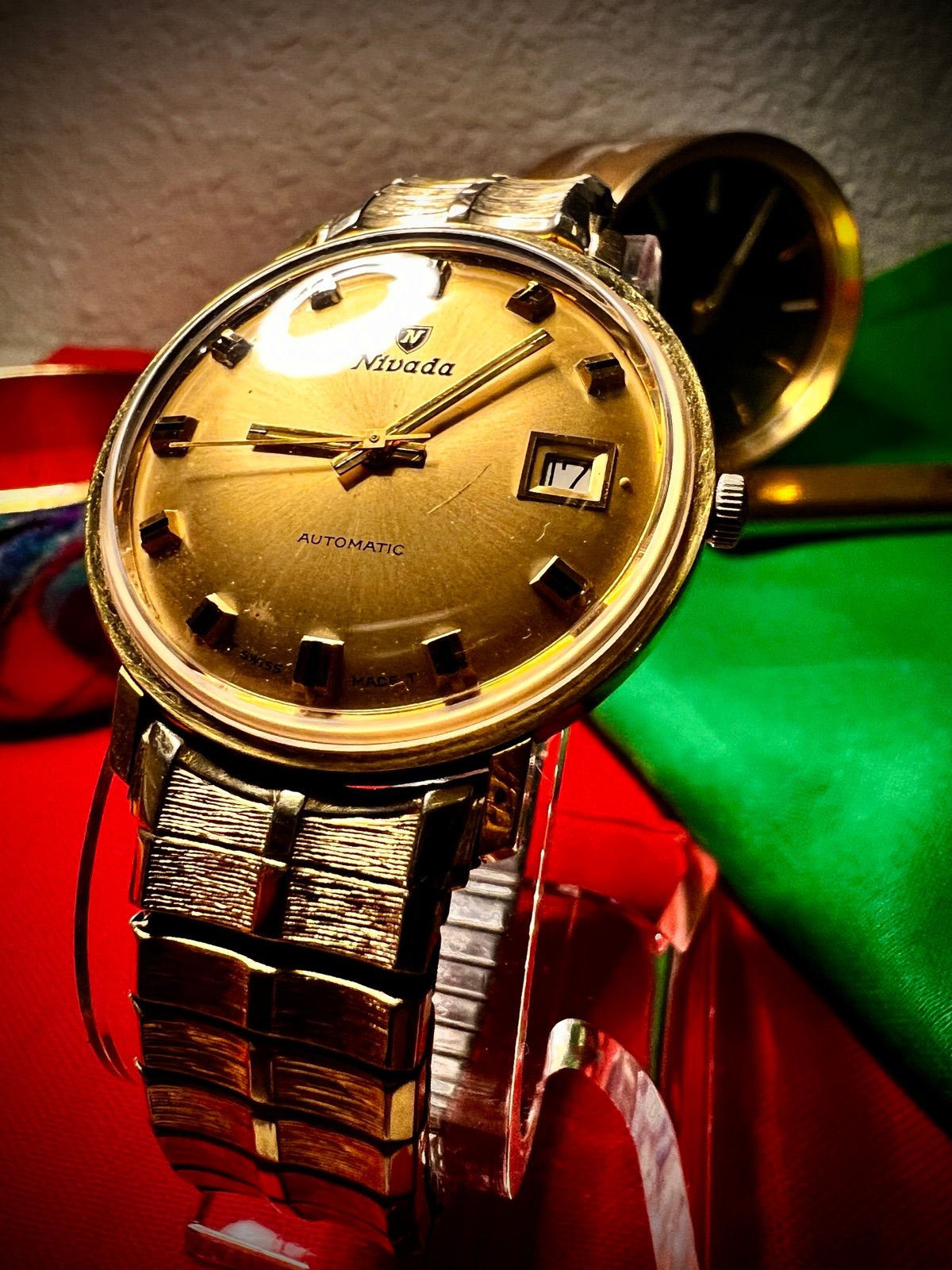 #1351 Nivada Date Automatic Gold color with Gold dial newish beautiful S.S back