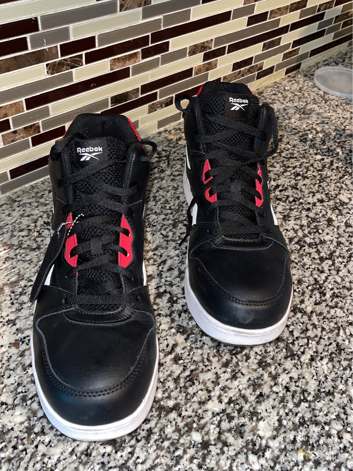 Reebok High top work sneaker