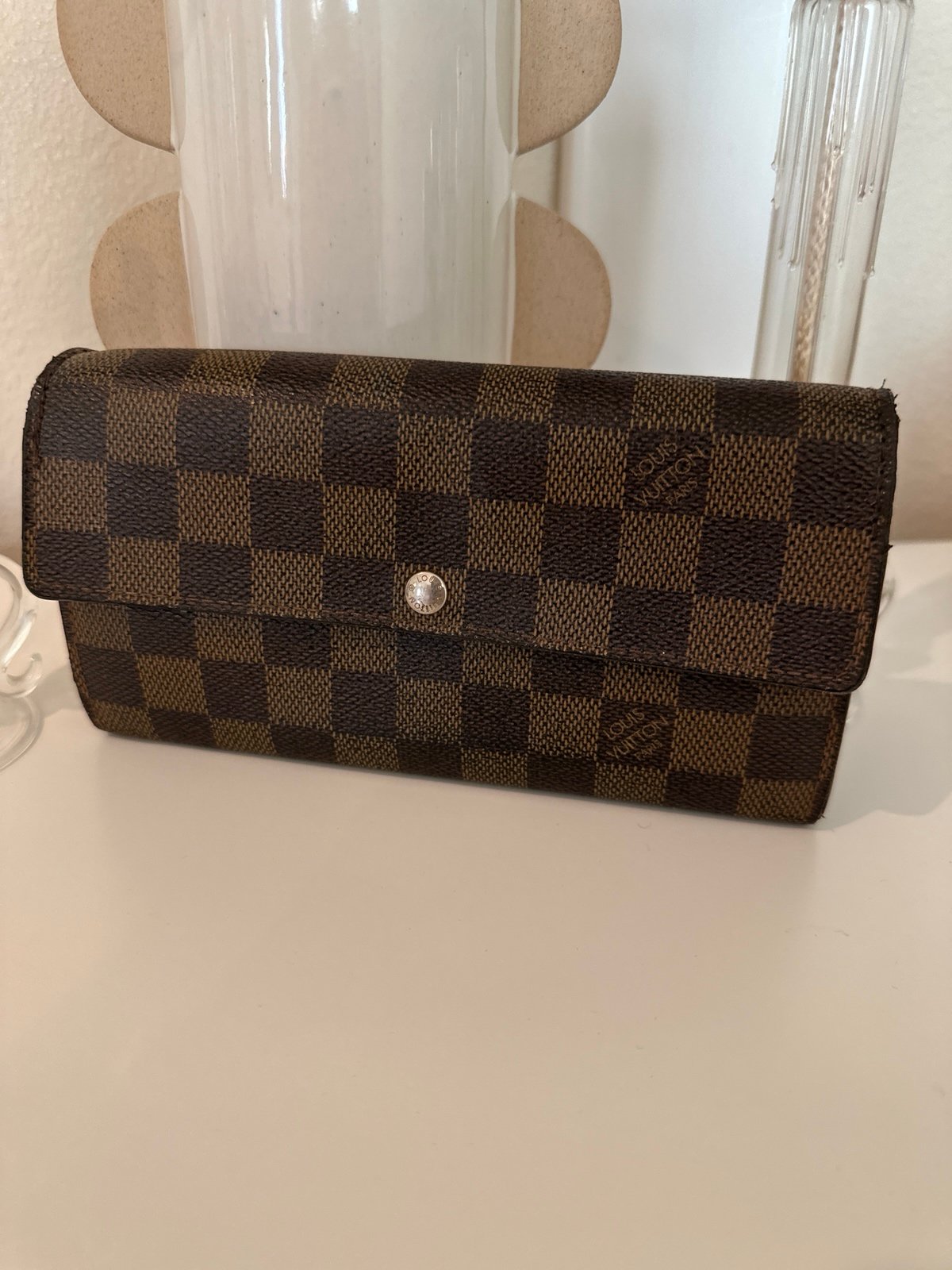 Authentic Louis Vuitton Ebene Sarah wallet old.