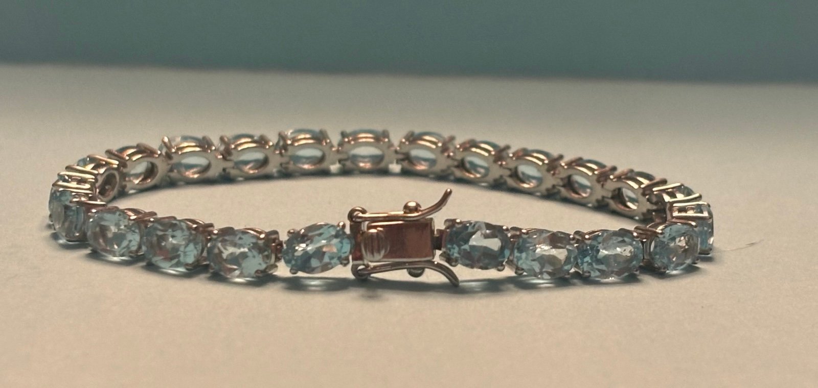 New blue topaz sterling silver tennis bracelet. Sz M