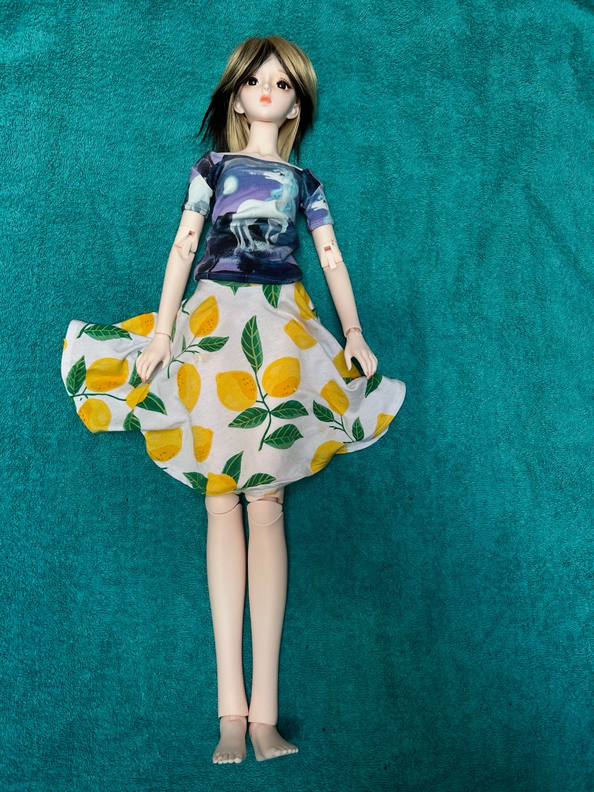 Articulated Ball Jointed Doll with eyes, wig and clothes