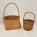 Hand Crafted Baskets (2)(One 10.25 T x 5 W x 4 D) (One 6.75 T x 5 W x 3 D)
