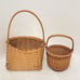 Hand Crafted Baskets (2)(One 10.25 T x 5 W x 4 D) (One 6.75 T x 5 W x 3 D)