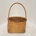 Hand Crafted Baskets (2)(One 10.25 T x 5 W x 4 D) (One 6.75 T x 5 W x 3 D)