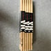 1 brick (12 pair) of Vic Firth Rick Dior drumsticks.