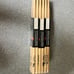 1 brick (12 pair) of Vic Firth Rick Dior drumsticks.