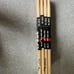 1 brick (12 pair) of Vic Firth Rick Dior drumsticks.