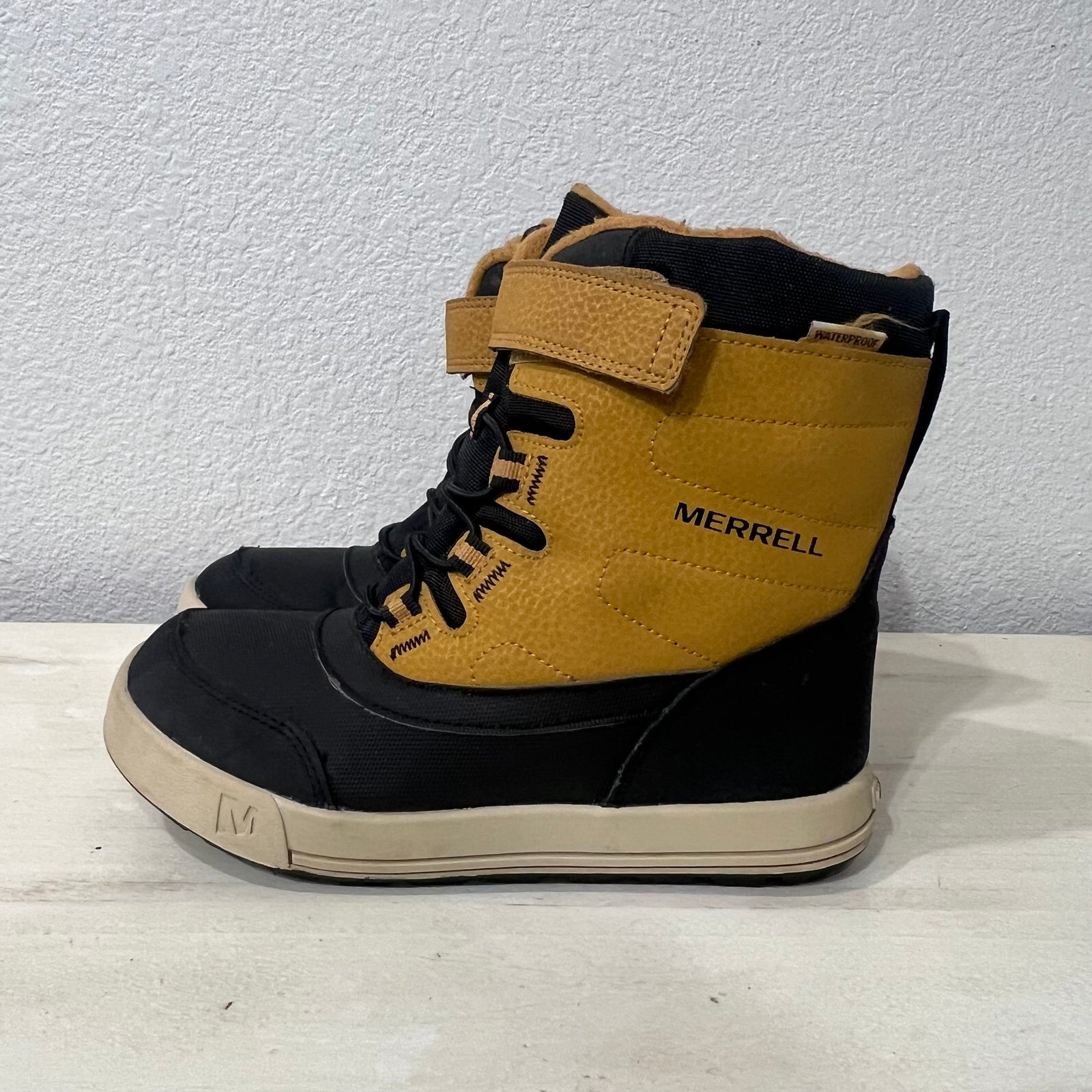 Merrell yellow/Black Snow Storm Boots