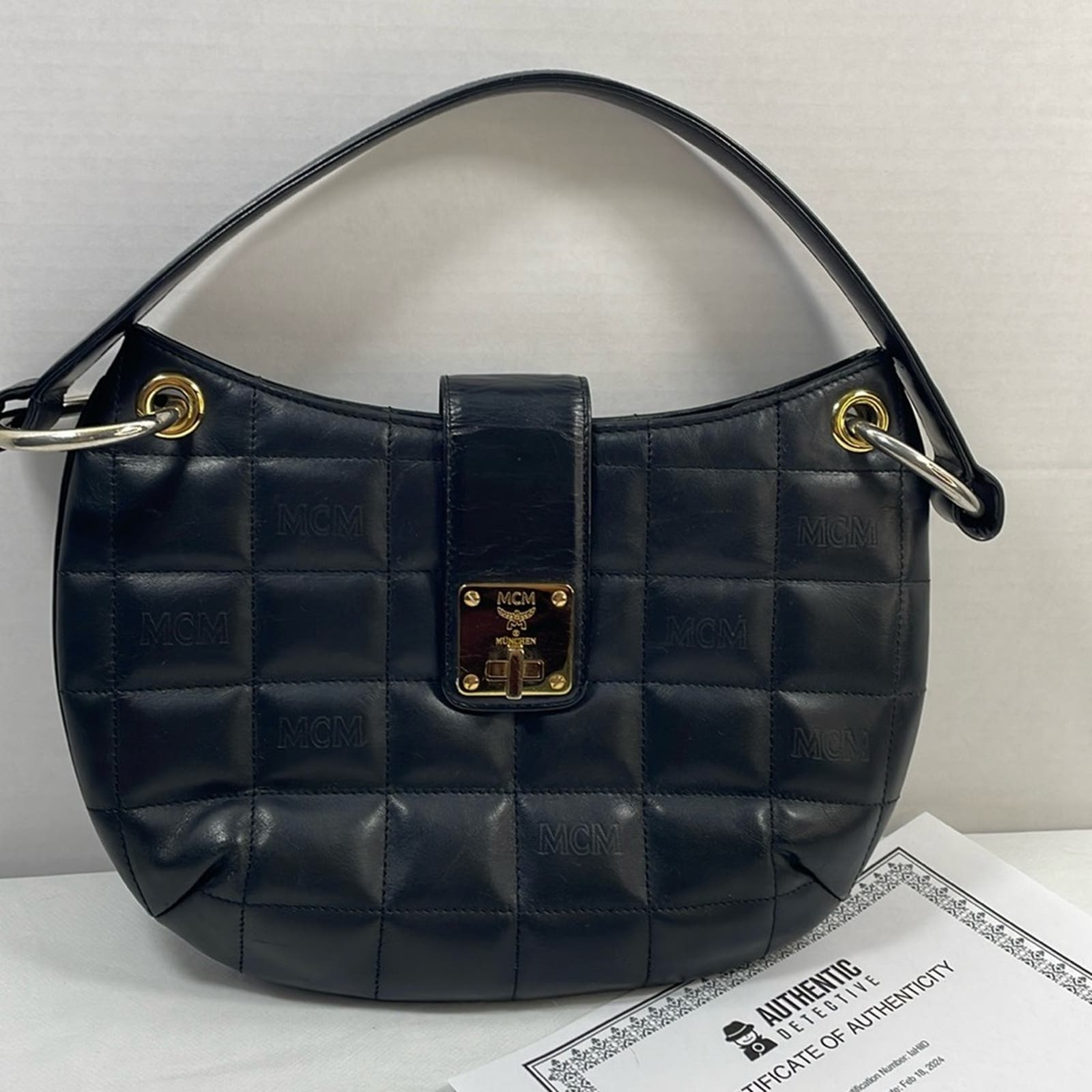 Authentic MCM, black leather quilted hobo shoulder bag with COA