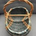 Vtg Handmade Blue Large Buttock Woven Basket With Infinity Knot Vine Handle