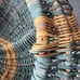 Vtg Handmade Blue Large Buttock Woven Basket With Infinity Knot Vine Handle