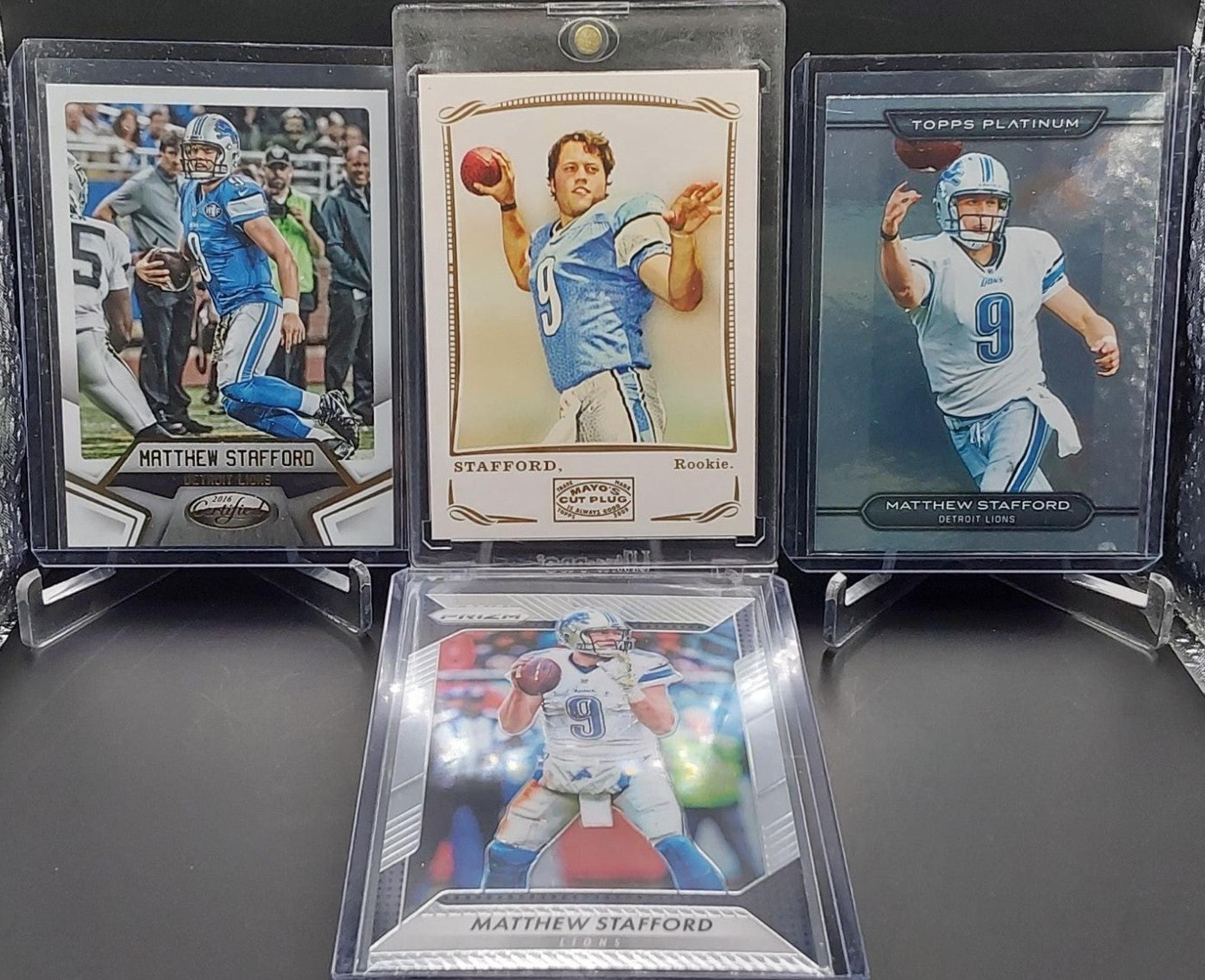 A lot of 4 Matthew Stafford cards