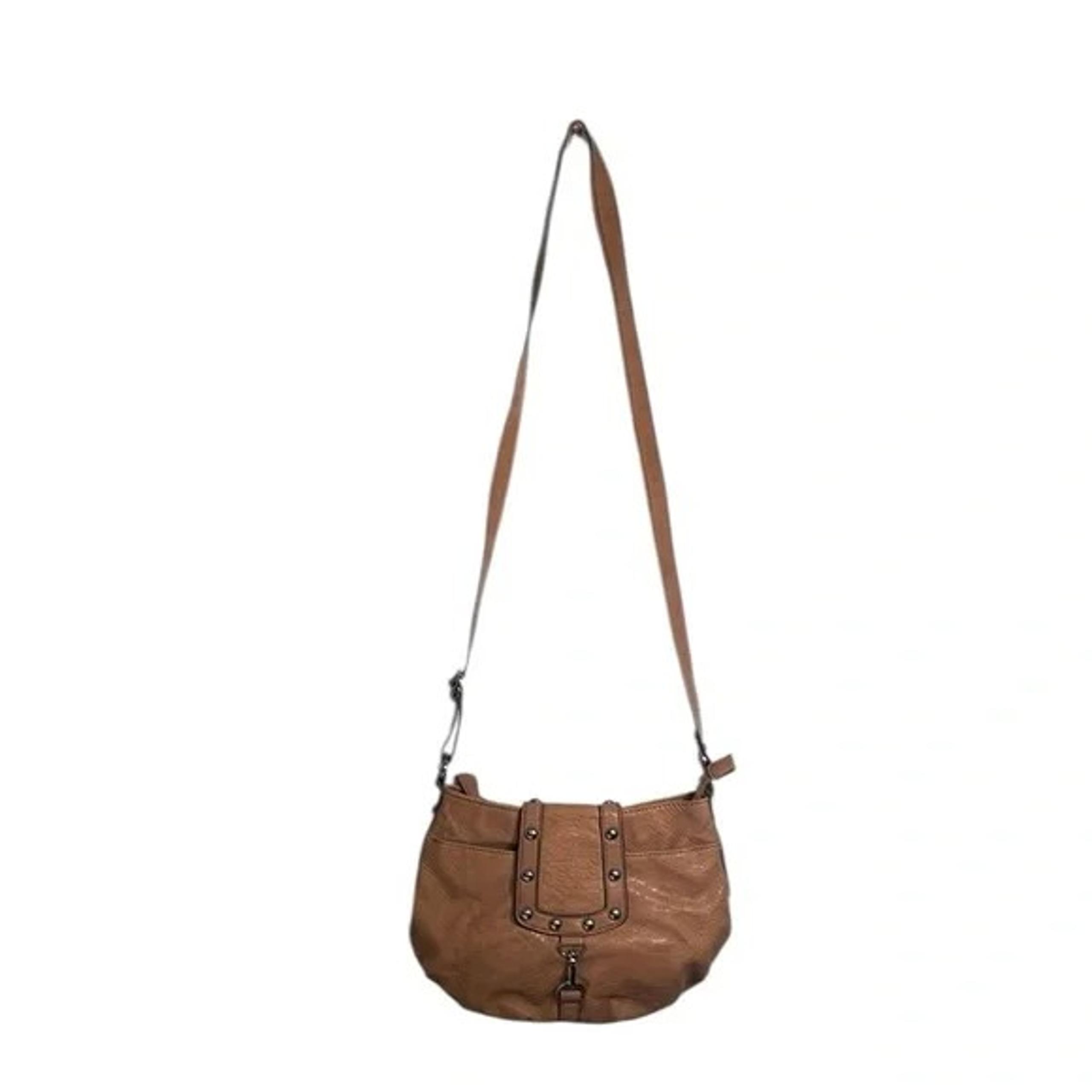 Jessica Simpson tan purse w/gold grommets & hardware. 13”x10”x3” Shoulder strap