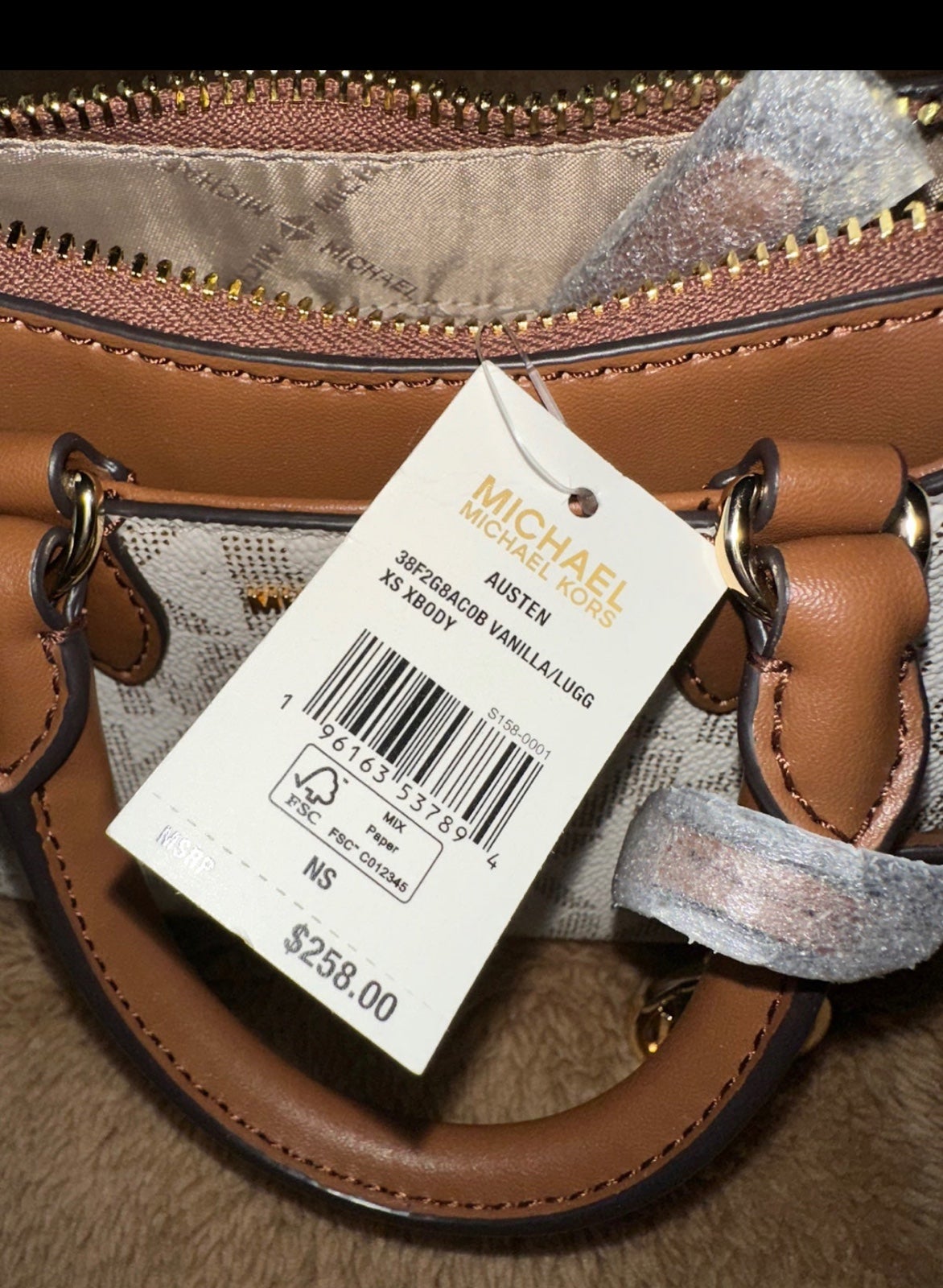 New with Tags Michael Kors store XSmall Austen crossbody.