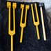 NEW Entire set 8 tuning forks gold tone all chakra healing