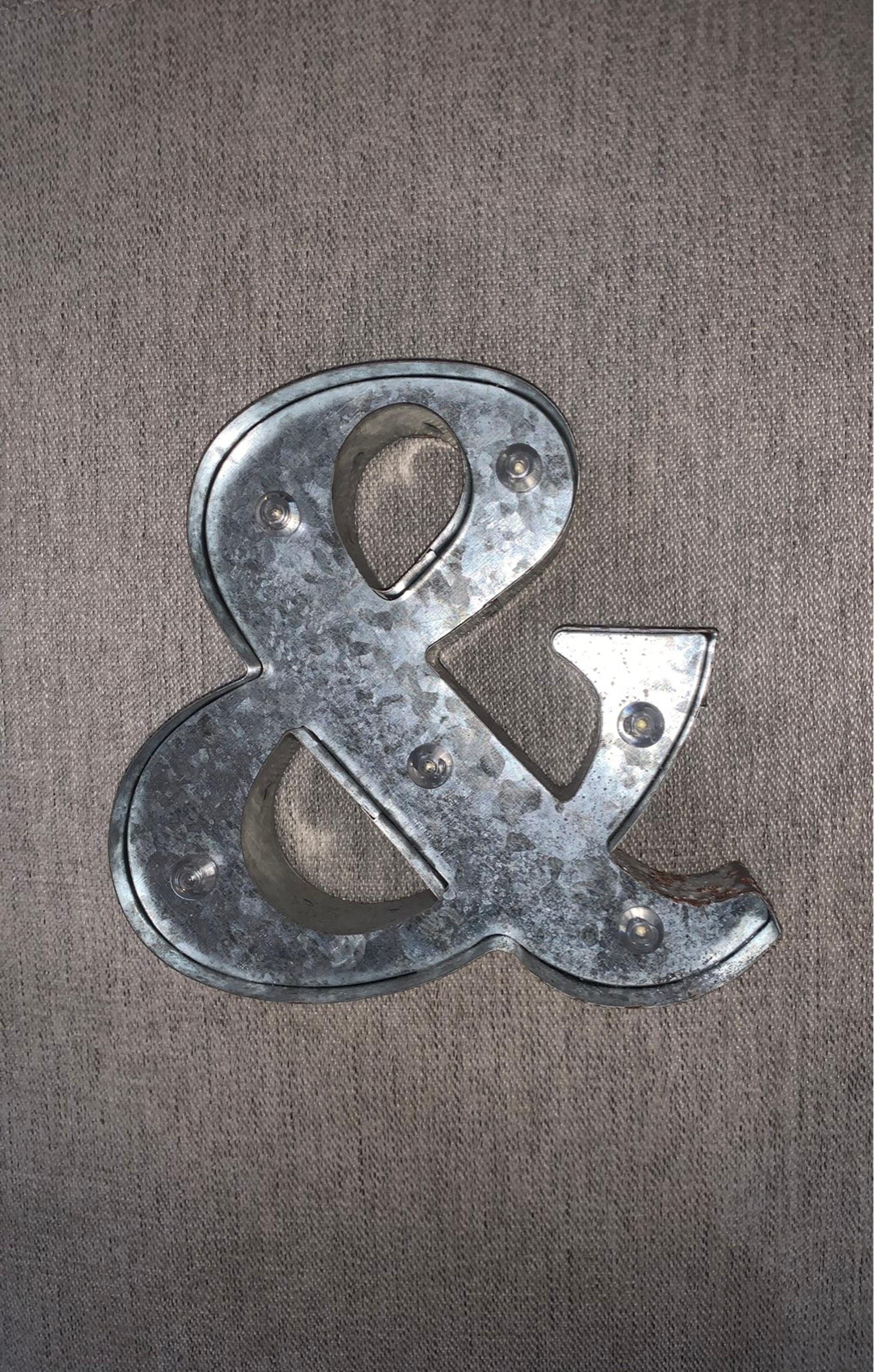 Silver distressed ampersand symbol decor accent - Anthropologie
