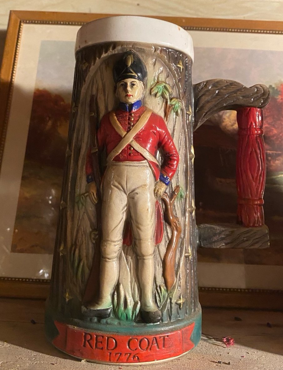 vintage Napcoware ceramic beer stein featuring a "Red Coat" soldier