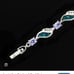Opal & Tanzanite with diamond chips bracelet .