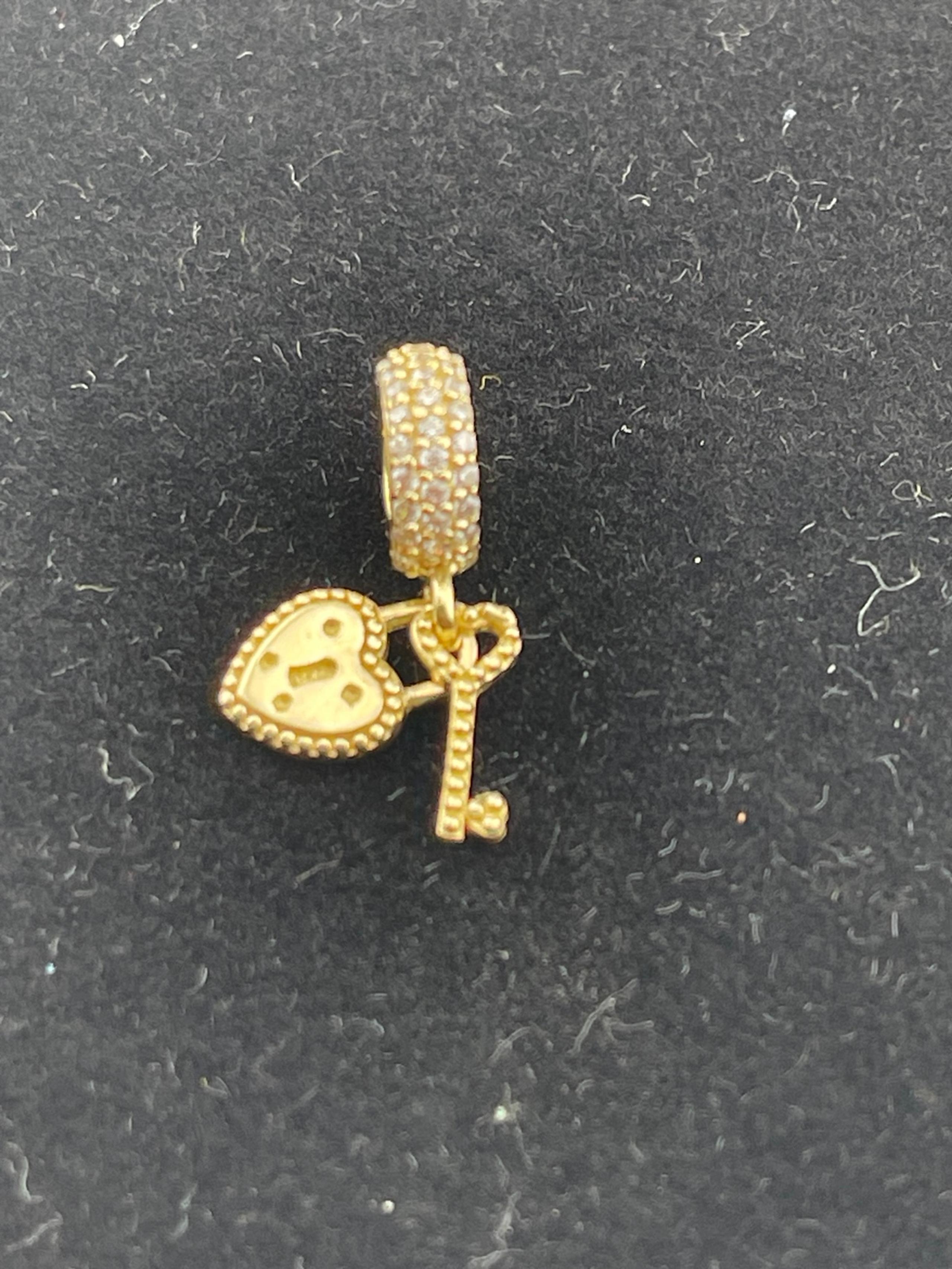 Vintage heart and key simulated, diamond pendant, 10 karat yellow gold