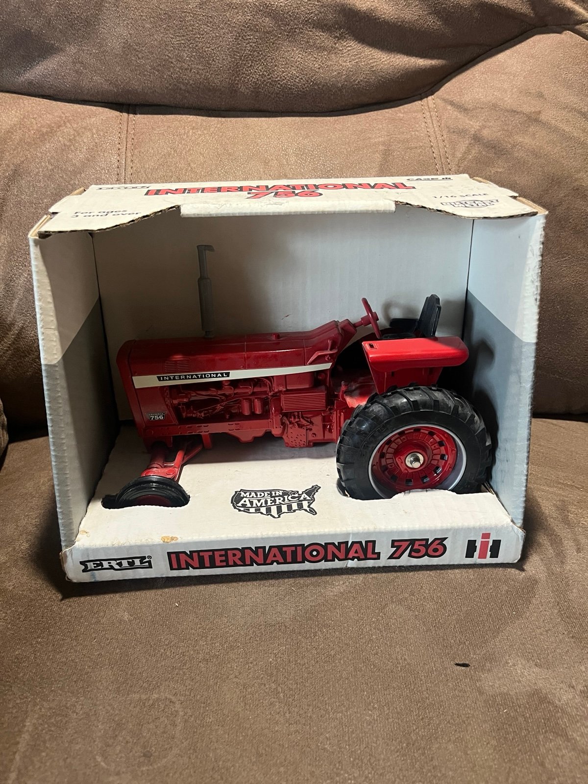 Ertl international 756 has damage in one corner of box
