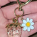 Strawberry clear sparkles gold keychain with daisy and gold heart hardware