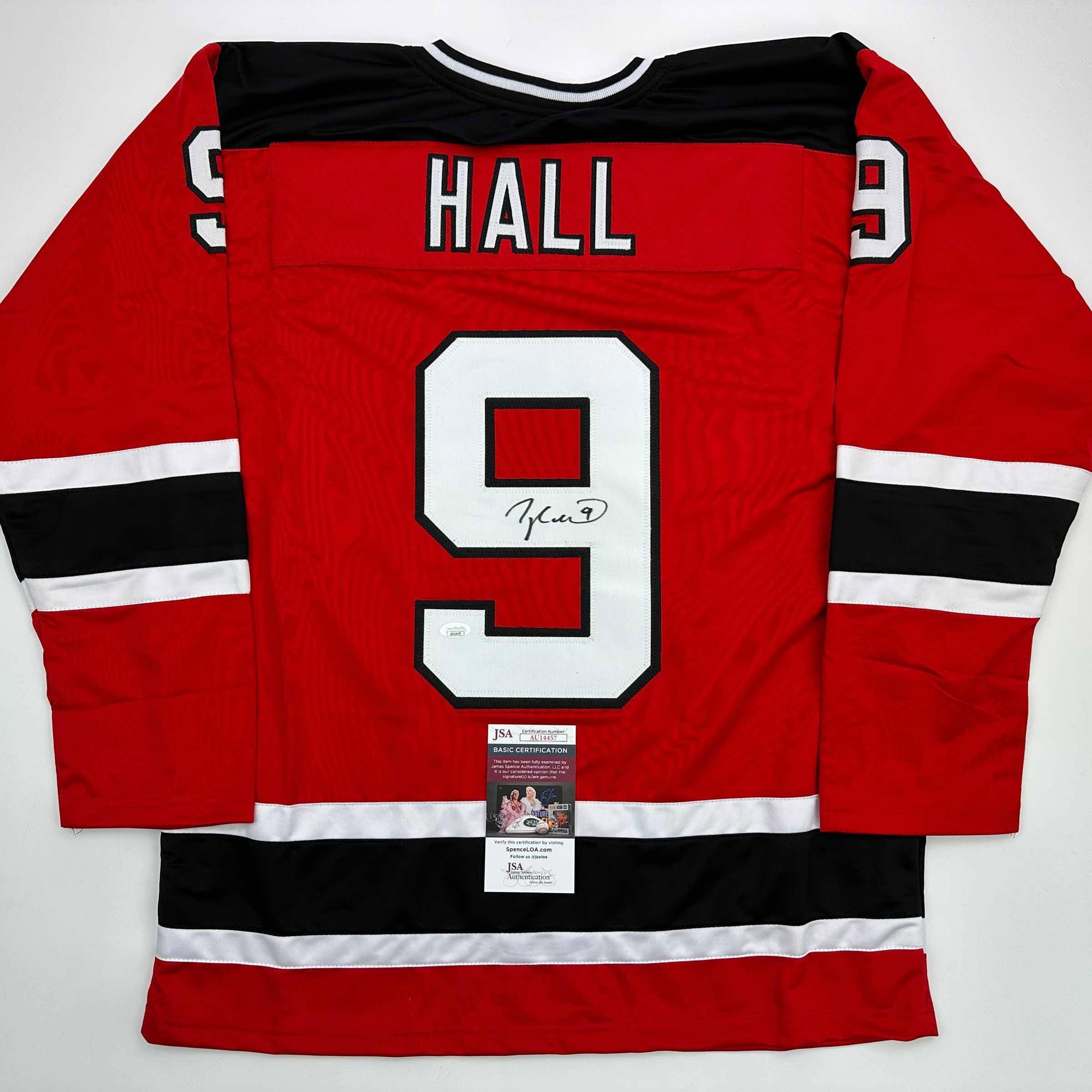 Autographed/Signed Taylor Hall New Jersey Red Jersey JSA COA