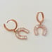 Rose gold plated cz horseshoe earrings