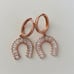 Rose gold plated cz horseshoe earrings