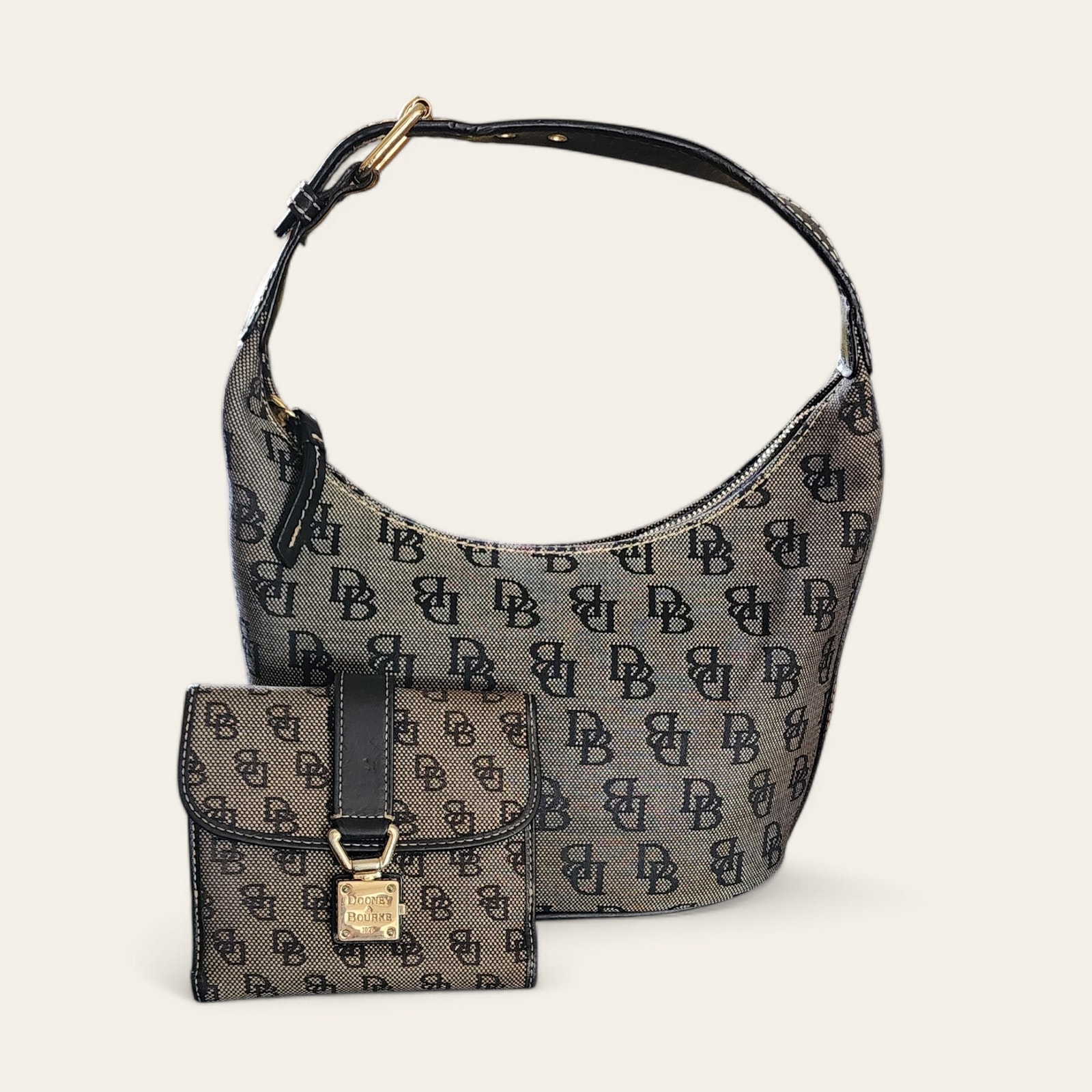 Vintage Dooney and Bourke canvas & leather hobo with wallet.