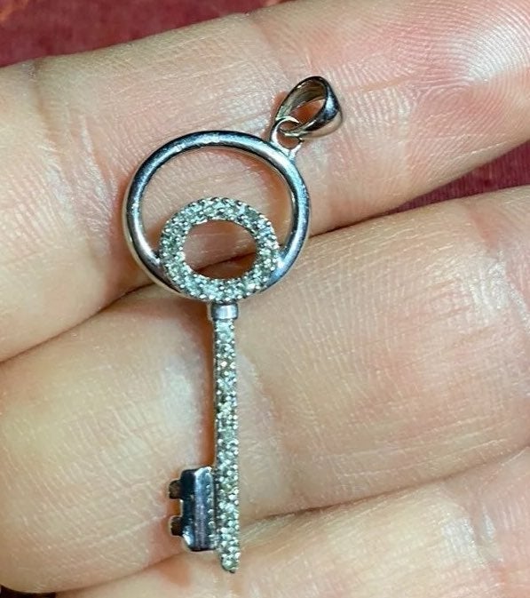 10k charm key