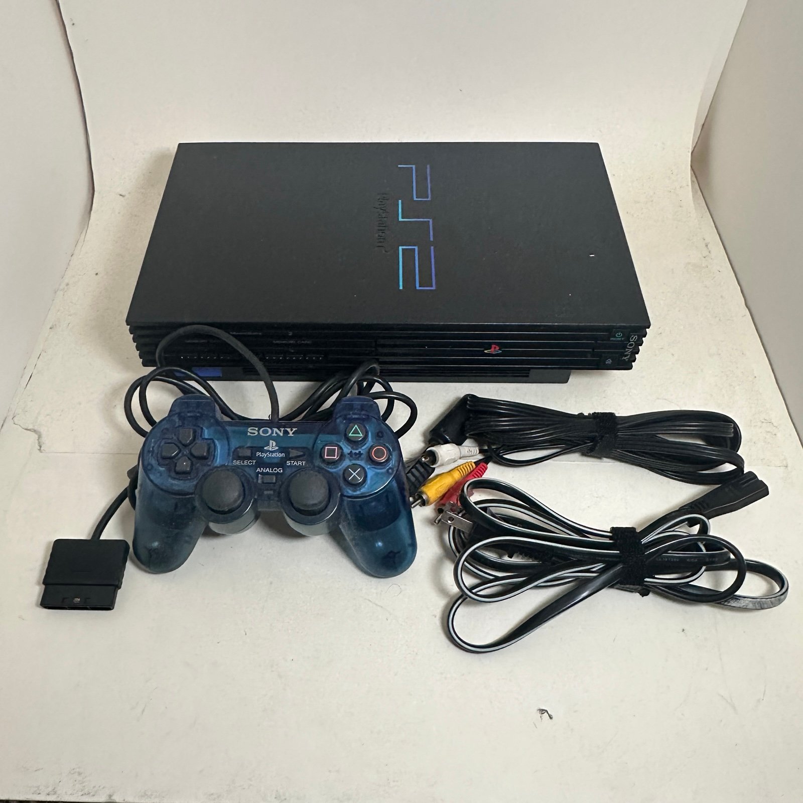 Complete PlayStation 2 with controller & 12 games