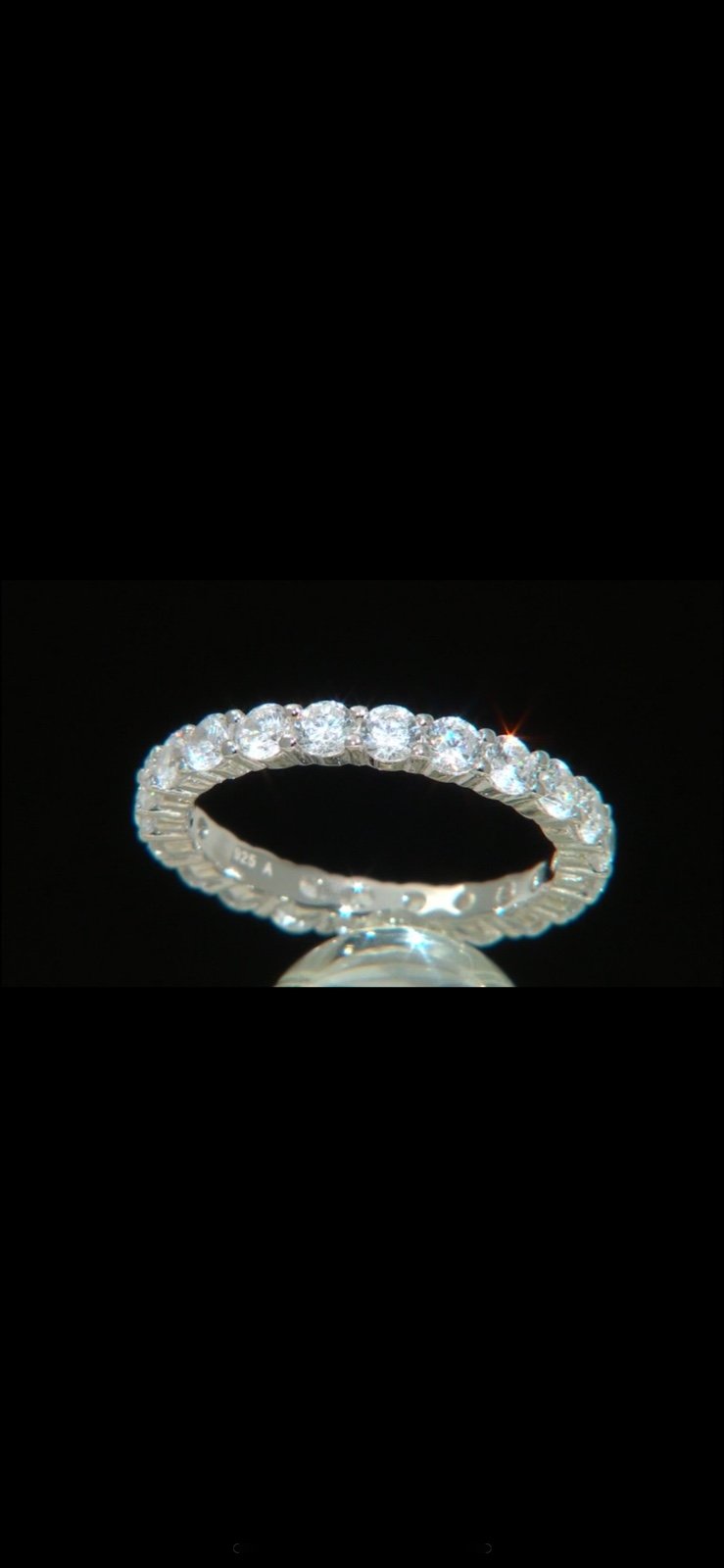 New with tags cubic zirconia eternity band ring. Size 10.