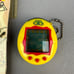 Rare Vintage Animal Virtuel French Tamagotchi Complete With Package Yellow Red