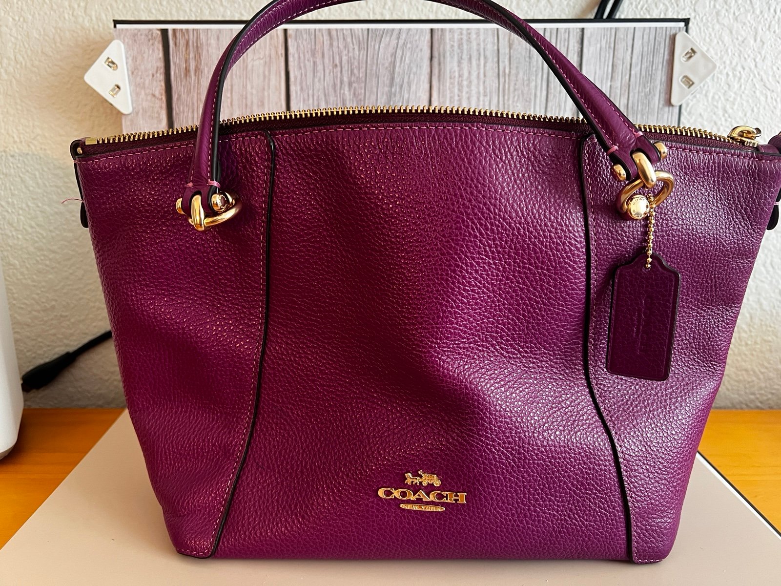 Super clean and gently used purple Coach purse.