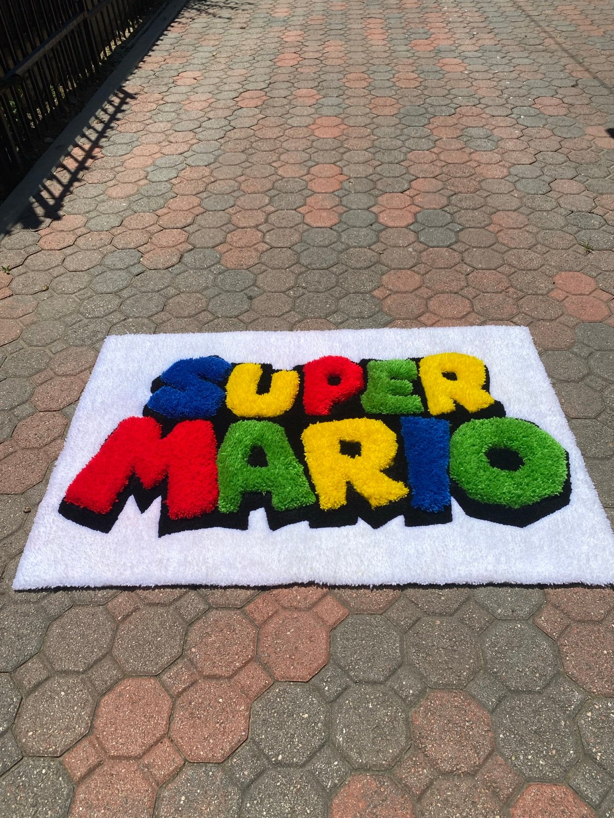 Super Mario 3D logo rug