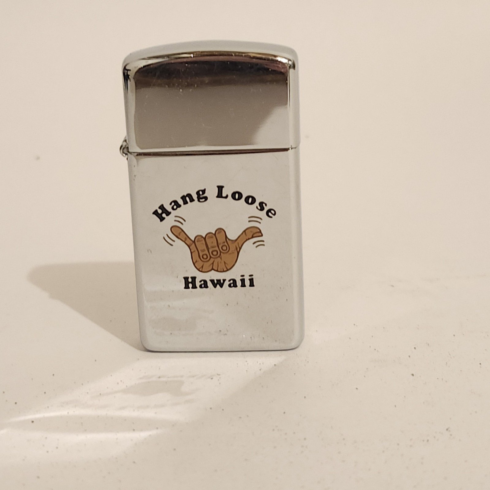 Vintage Zippo 1986 Hang Loose Hawaii Ultralite Oil Lighter Unfired