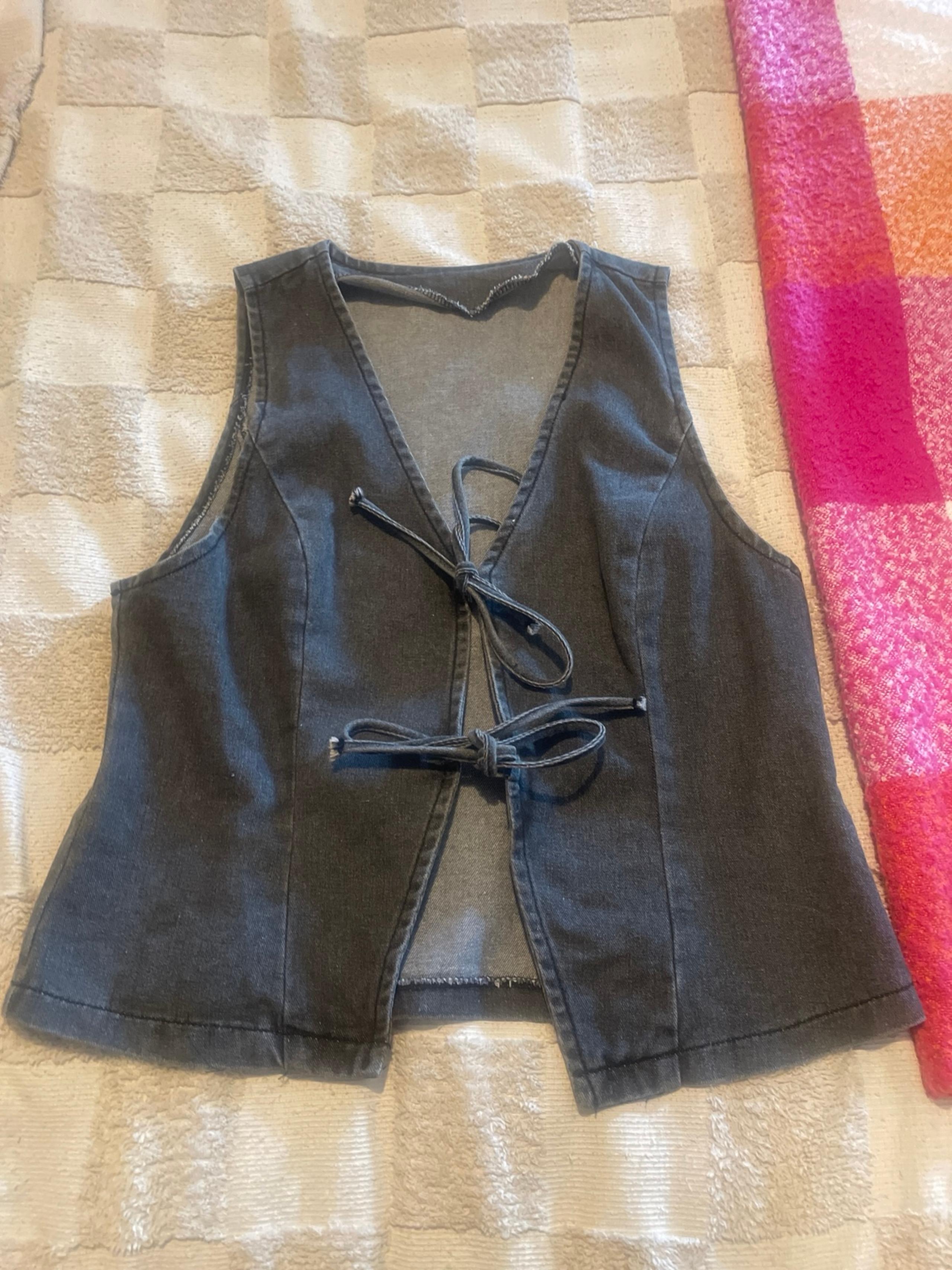 Black denim vest