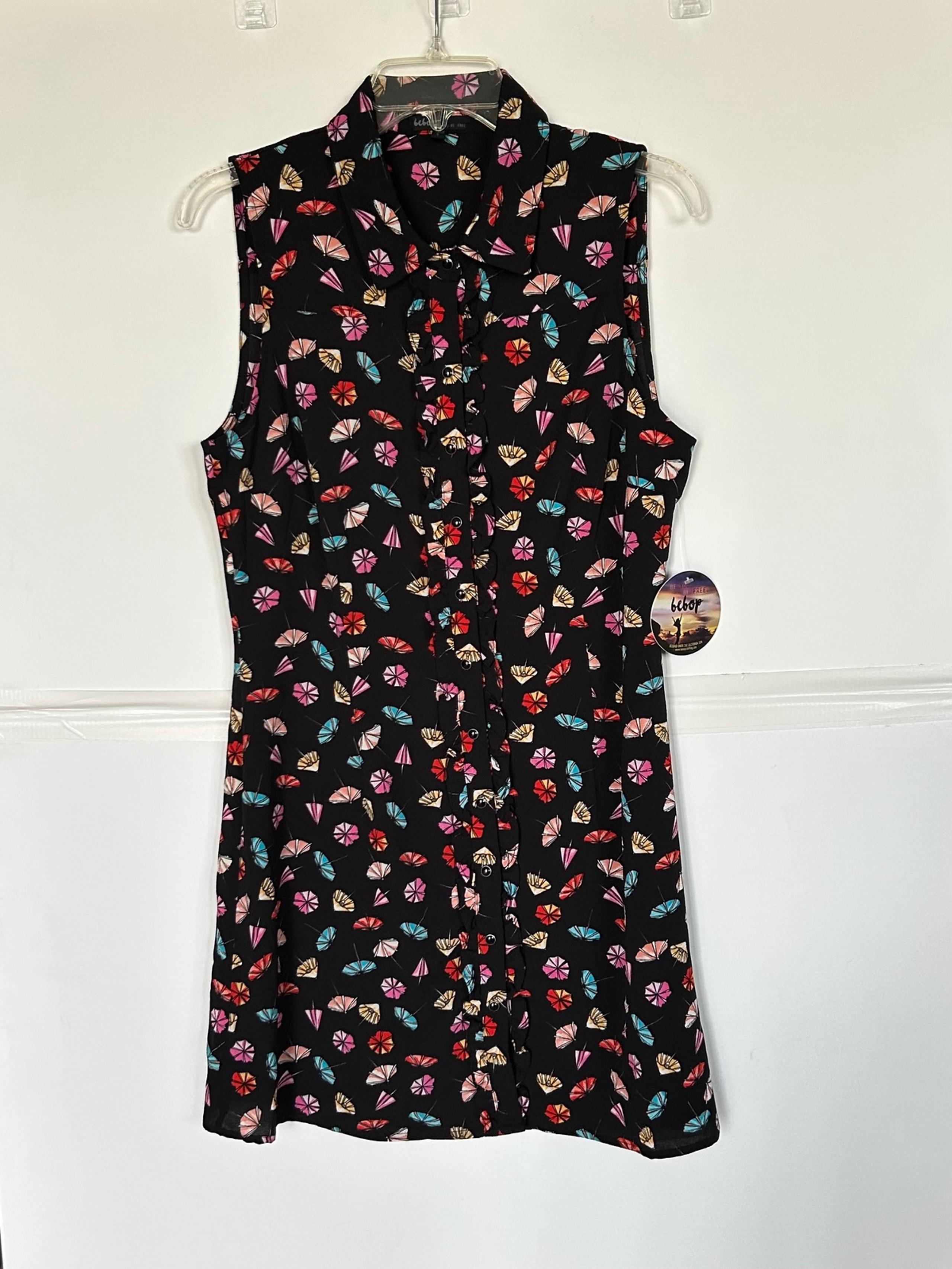 BeBop woman’s sleeveless black dress with umbrella design. Snap closure. Size L